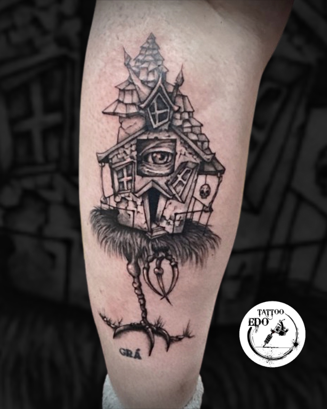 Illustrative blackwork haunted house tattoo by Edo Tattoo