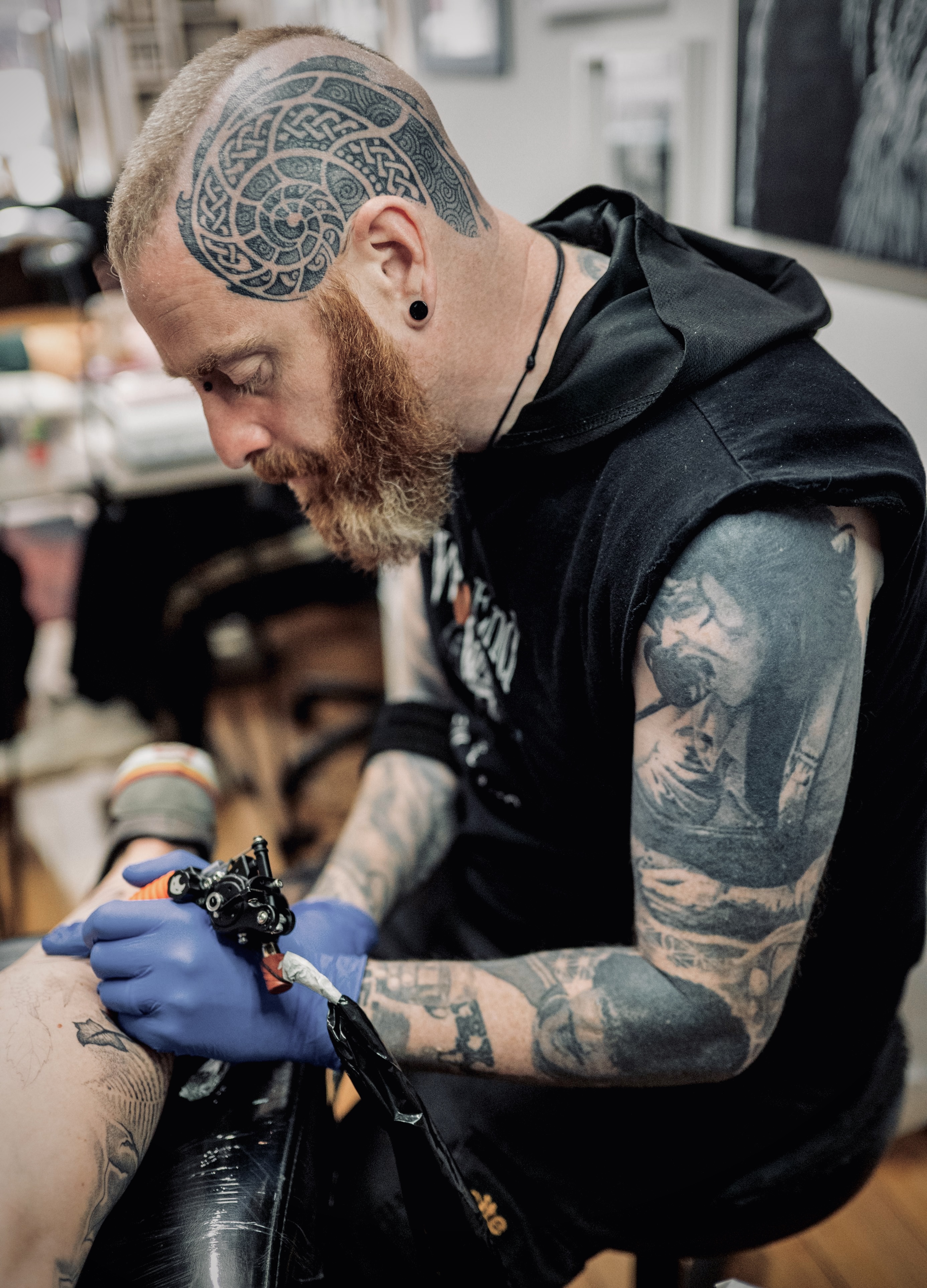 Jarlath Tourish tattooing at West End Art Collective