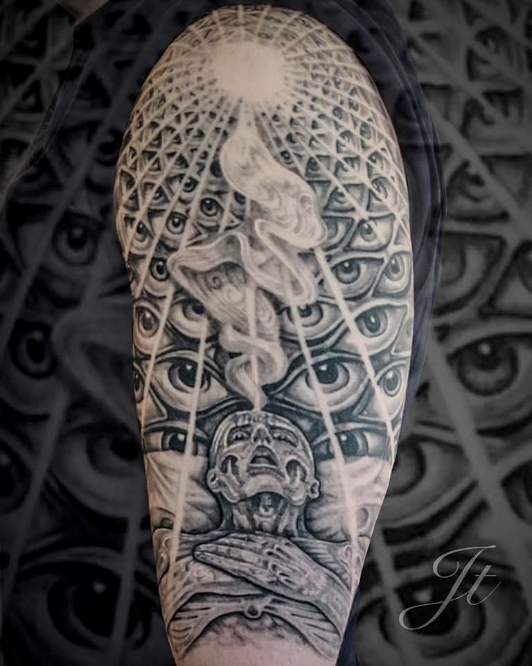 Atmospheric symbolic sleeve tattoo with sacred geometry and eyes, by Jarlath Tourish